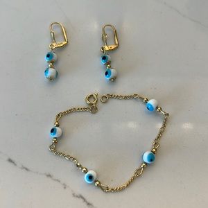 Evil eye glass bead and gold tone bracelet and earring set NEW